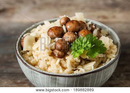 Mushroom Risotto With Parmesan Cheese. Italian Food. Simple Back