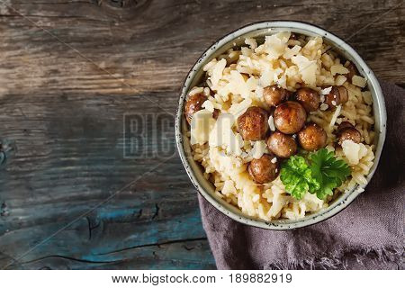 Mushroom Risotto With Parmesan Cheese. Italian Food. Simple Back