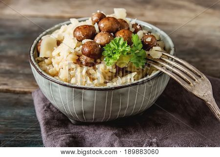 Mushroom Risotto With Parmesan Cheese. Italian Food. Simple Back
