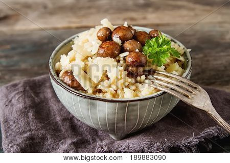 Mushroom Risotto With Parmesan Cheese. Italian Food. Simple Back