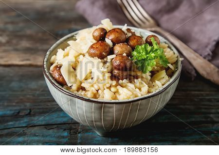 Mushroom Risotto With Parmesan Cheese. Italian Food. Simple Back