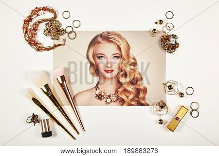 Fashion lady accessories collage. Falt Lay. Beauty photography. Make-Up brushes. Jewelry and lipstick. Fashion portrait of young beautiful woman with elegant hairstyle