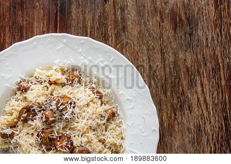 Mushroom Risotto With Parmesan Cheese. Italian Food. Simple Back