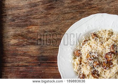 Mushroom Risotto With Parmesan Cheese. Italian Food. Simple Back