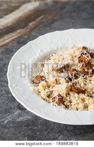 Mushroom Risotto With Parmesan Cheese. Italian Food. Simple Back