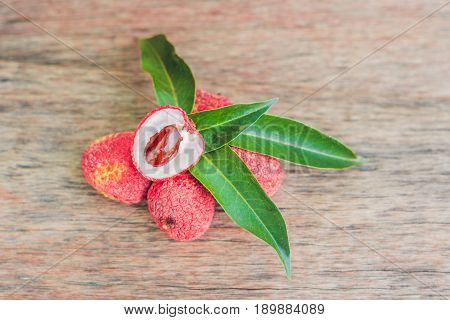Fresh Litchi Fruit On An Old Wooden Background