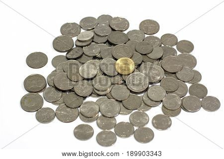 A pile of silver coins on top with a golden coin with white background business concept.
