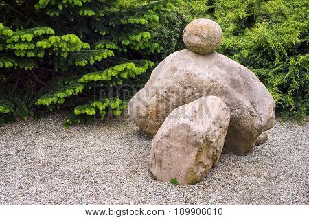 Japanese zen stone garden. Landscape green park with stones in asian style.