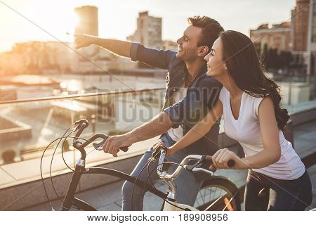 Romantic Couple With Bicycles In The City