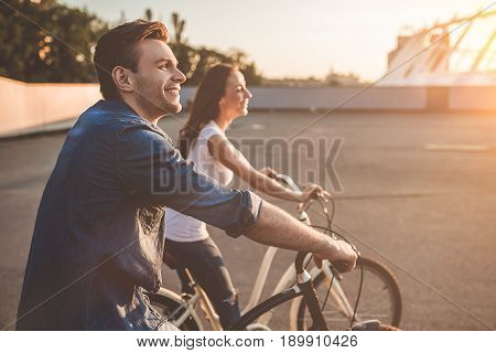 Romantic Couple With Bicycles In The City