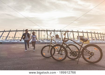 Romantic Couple With Bicycles In The City