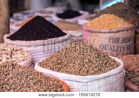 Sacks of green coffee and spices in Ethiopian market