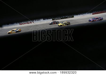 June 04, 2017 - Dover, DE, USA: Kyle Busch (18) battles for position during the AAA 400 Drive for Autism at Dover International Speedway in Dover, DE.