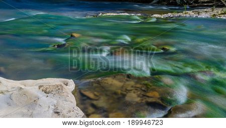 Background Of Carpathian Mountain River With Long Exposure