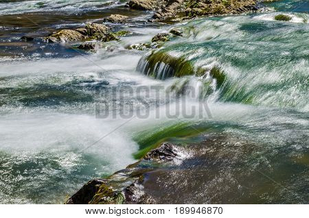 Background Of Carpathian Mountain River With Long Exposure