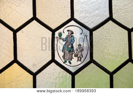 Vilnius Lithuania - May 05 2017: Stained glass window Inside the old building of Philology Faculty in Center of lithuanistics of Vilnius University Vilnius Lithuania.