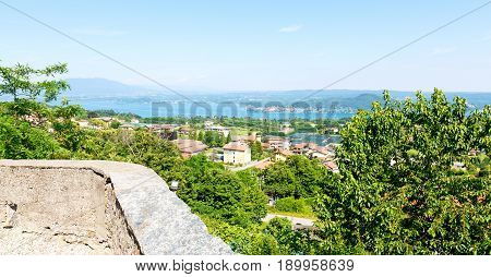 In Italy Landscape Panorama Of Lake And Mountain