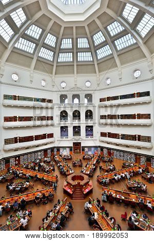 MELBOURNE - May 13 2017: La Trobe reading room at the State Library of Victoria in Melbourne. The library holds over 2 million books.  It is the central library of the state of Victoria, Australia.