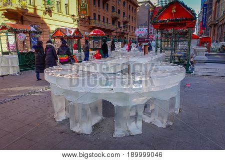 Harbin, China - February 9, 2017: Zhongyang pedestrian street, central street is a popular and commercial long corridor of European architectural art