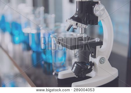 Microscope And Test Tubes In Laboratory  And Laboratory Tools In Reseach Laboratory