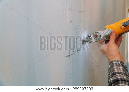 Cutting Plasterboard Plaster Drywall Hand With Electro Saw