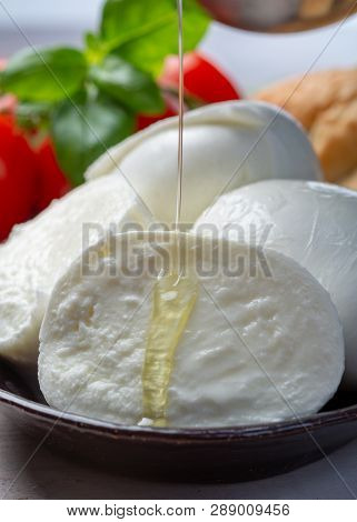Balls And Pieces Of Buffalo Mozzarella, Soft Italian Scheese Made From The Milk Of Italian Mediterra