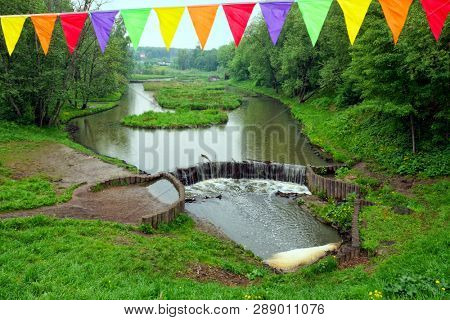 Chermyanka river in a park in Moscow, cloudy weather.
