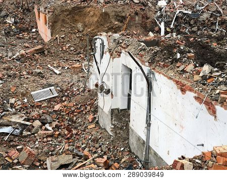 Wall Remnants And Rubble After House Demolition Or Teardown