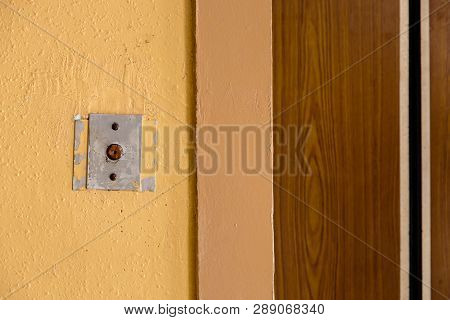 Old Elevator Call Button With Grungy Pattern In A Soviet Building In Post-soviet Riga, Latvia