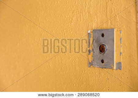 Old Elevator Call Button With Grungy Pattern In A Soviet Building In Post-soviet Riga, Latvia