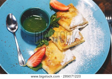 Russian Traditional Pancakes, Blini On Blue Plate