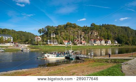 Rathen, Germany - October 04, 2018: Ferry Traffic In The Resort Rathen In The Elbe Sandstone Mountai