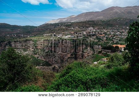 Faraya Valley And Village With Scattered Houses Shot From The Hill. Lebanon