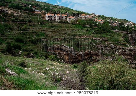 Faraya Valley And Village With Scattered Houses Shot From The Hill. Lebanon