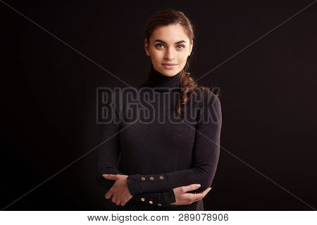 Beautiful Smiling Woman Posing At Isolated Black Background