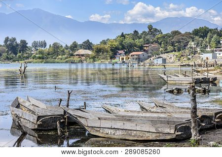 Santiago Atitlan, Lake Atitlan, Guatemala - March 8, 2019: Rows Of Lakeside Traditional Canoes In La