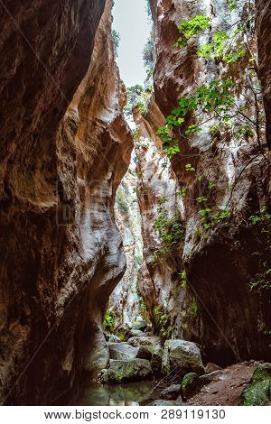 Stuck Hanging Stone In Avakas Canyon. Akamas Peninsula Landscape. Cyprus Landmark