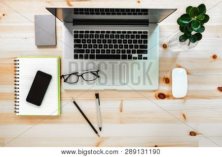 Layout Workspace Of Personal Laptop On Table, Creative Designer Workplace On Top View. Mouse, Smartp