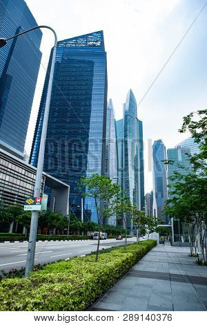 Commercial building in business disctrict of Singapore at noon