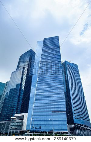 Commercial building in business disctrict of Singapore at noon