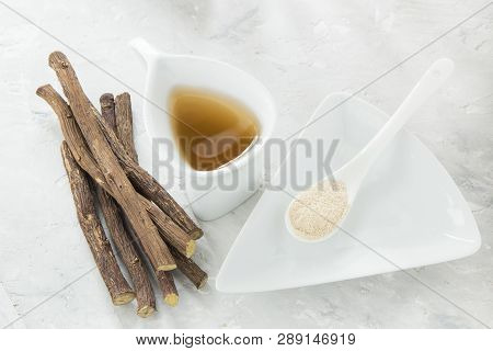 Licorice Tea, Powder And Roots On The Table