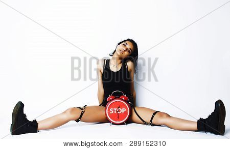 Young Pretty Indian Girl With Red Alarm Clock Posing Cheerful On White Background Isolated, Sexy Mod