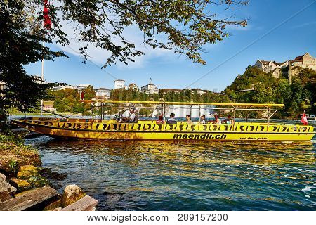 Rhine, Switzerland - September 19, 2018: Tourist Ship On The Rhine River Near The Rhine Falls In Swi