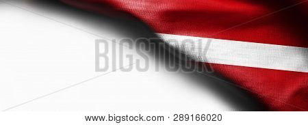 Fabric Texture Flag Of Republic Of Latvia. On White Background
