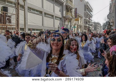 Xanthi, Greece - March 10 2019: Carnival Parade Participants Marching In Costumes.every Year Teams P
