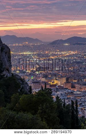 View Of Athens And Piraeus From Lycabettus Hill At Sunset, Greece.