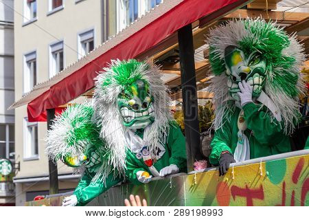 Basel, Switzerland - March 11, 2019: Participants At The Parade Of The Carnival Of Basel. The Carniv