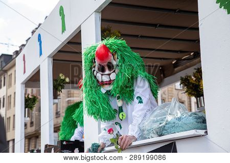 Basel, Switzerland - March 11, 2019: Participant At The Parade Of The Carnival Of Basel. The Carniva