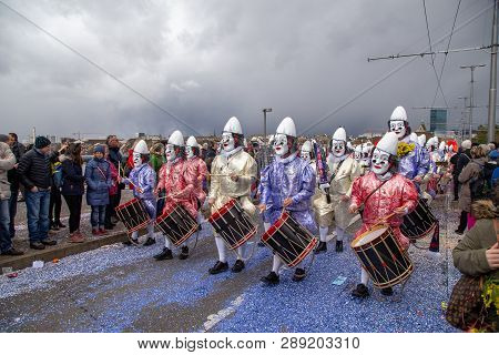 Basel, Switzerland - March 11, 2019: Participants At The Parade Of The Carnival Of Basel 2019. The C