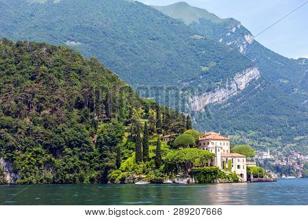 Lake Como, Italy - June 15, 2012: Summer Lake Shore View From Ship Board. Villa Del Balbianello.